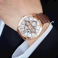 Montre à quartz pour homme, cadran squelette, chiffres romains, boîtier en or rose, bracelet en cuir marron, montre de soirée formelle