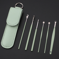 Kit de retrait de cérumen Outil de nettoyage d'oreille avec cure-oreille en cuir avec sac en cuir