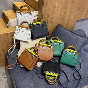 قوانغتشو مصنع النساء عالية الجودة جديد حقيبة كتف حقيبة بسيطة النمط الغربي السيدات الخيزران مقبض حمل حقيبة