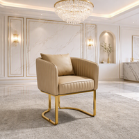 Fauteuil d'appoint moderne en similicuir rembourré avec structure en métal doré pour salon