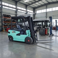Chariot élévateur électrique 1,5 tonne à batterie lithium hydraulique, modèle 2026, idéal pour la manutention industrielle en entrepôt - Vente chaude