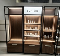 Étagère de présentation cosmétique modulaire en bois noir MDF et fer avec logo personnalisé CE ETL, présentoir de maquillage mobile avec boîte lumineuse