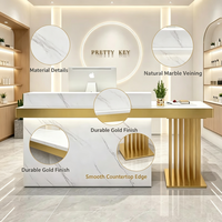 Comptoir de réception en marbre de luxe léger avec cadre métallique doré, comptoir d'accueil moderne pour salon de beauté et spa, OEM