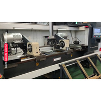 Tour CNC horizontal à double broche 4 axes à lit plat GSK HX-501800-160 de moyenne capacité avec système d'alimentation automatique pour tubes et arbres