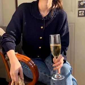 Venta al por mayor mujeres dulce cuello de muñeca Color sólido suéter botón cárdigan Otoño Invierno tejido Tops Simple abrigo corto Casual - Product Image 2