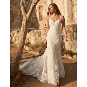 Ethereal Train Wedding Dress V-Neck Mermaid Silhouette Embroidered White Gown For Church Lawn Weddings - Product Image 1