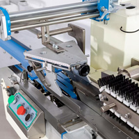 Machine d'emballage horizontale automatique 380 pour gâteaux, gaufrettes, biscuits et autres produits alimentaires, avec fonction de mise en carton et d'emballage coussin