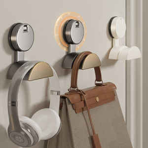 Ganchos de pared con ventosa para almacenamiento de bolsas, montaje sin perforaciones, acabado pulido, organizador con forma redonda - Product Image 1