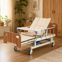 Lit médical à quatre manivelles manuelles, avec sommier incurvé et panneaux de tête et de pieds en bois pour le contrôle de la posture, pour usage quotidien en milieu de soins à domicile