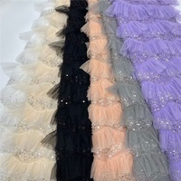 Nouveau style de tissu en maille africaine à volants et broderies en dentelle avec perles et paillettes faites à la main pour vêtements en polyester