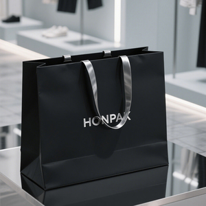 Poignée de vêtements avec impression personnalisée logo Shopping de luxe Vos sacs de transport Propre vente en gros de ruban de marque papier blanc sac en papier personnalisé - Product Image 2