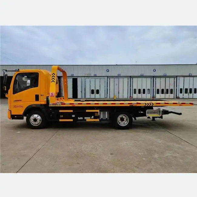 HOWO 4*24トンウィンチレッカー車道路緊急救助レッカー車手動操作中国で使用されたフラットベッドトラック手動EURO5