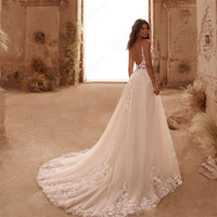 Robe de mariée taille personnalisée robe de mariée à bretelles spaghetti sexy col en v profond dos nu coupe ajustée robe de banquet en dentelle avec appliques