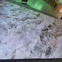 Feuille murale en marbre PVC brillant UV en fausse pierre d'impression 3D Alternative en faux marbre PVC imperméable pour mur