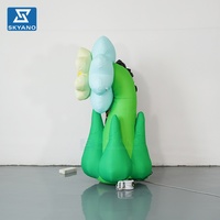 Modèle de fleur bleue gonflable personnalisé avec tige pour la décoration d'événements publicitaires en extérieur, sur scène ou dans un lieu touristique