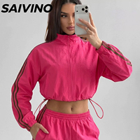 Nouvel ensemble de survêtement 2 pièces pour femme : veste courte zippée à manches rayées et short élastique pour la gym et le streetwear