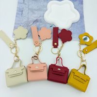 Mini porte-monnaie porte-clés en forme de sac à dos, breloque de sac de créateur, mignon, en cuir PU, pochette à monnaie, pendentif pour sac à main avec miroir floral