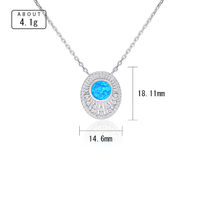 Collier vintage en argent sterling S925 massif avec pendentif fin en opale synthétique bleue ronde et cadre en zircon cubique rayonnant effet soleil