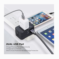 RRTRAVEL Adaptateur de prise universel multi-types avec double port USB industriel, matériau ignifuge pour les voyages au Royaume-Uni/UE/États-Unis/Australie