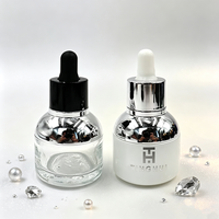 Flacons compte-gouttes en verre d'huile de visage vide avec placage or argent collier 20ml 30ml sérum rond flacon compte-gouttes à ampoule blanche