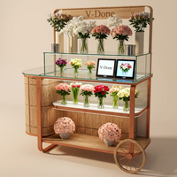 Stand de présentation mobile personnalisé pour fleurs avec étagères en verre et éclairage LED pour kiosque de fleuriste