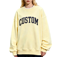 Sudadera Oversize Unisex Amarillo Crema con Texto Arqueado Personalizado, Cuello Redondo, Manga Larga, Estilo Casual, Venta al por Mayor OEM