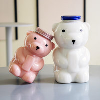 Bouteille de boisson en PET Little Bear Mango Pomelo Delight, modèle bouteille de thé au lait, style dessin animé mignon, très populaire sur internet, avec couvercle, gobelet jetable à emporter