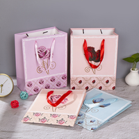 Fabricants de cadeaux personnalisés, vêtements, shopping, sac d'emballage en papier pour la Saint-Valentin, sac en papier décoratif pour mariage