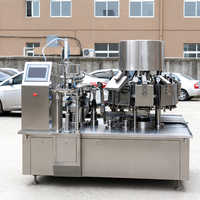 Machine d'emballage rotative multifonction électrique automatique pour emballer les pointes de poulet, les morceaux de poulet, les poitrines de poulet dans des sachets préformés