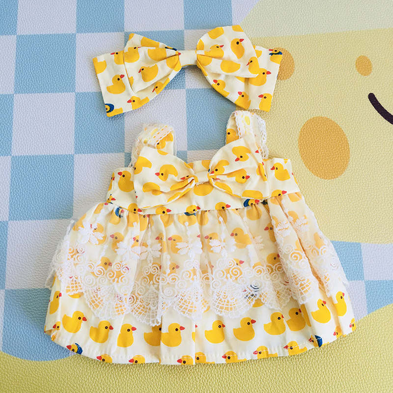 Yellow duck strap dress hairband