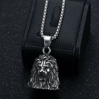Collier Cloche Exorciste Porte-Bonheur en Acier Inoxydable Style Moto Punk Rétro Tête de Lion