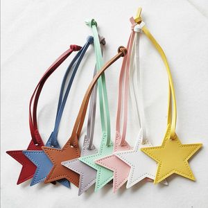 <span class=keywords><strong>2025</strong></span> bán buôn <span class=keywords><strong>PU</strong></span> da <span class=keywords><strong>Keychain</strong></span> dập nổi da năm sao Móc khóa hình dạng ngôi sao túi Mặt dây chuyền - Product Image 3