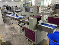 Automatische op- en neergaande horizontale verpakkingsmachine voor snoep, koekjes, zeep, brood, fruit, groenten, multifunctionele verpakkingsmachine
