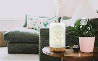 Vente en gros 100ml de diffuseur d'arôme en céramique d'huile essentielle de synchronisation creuse intelligente LED aromathérapie pour la maison hôtel
