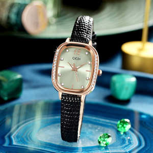 Montre élégante pour femme, ovale, sertie de diamants, en cuir véritable, élégante et de grande valeur, à quartz - Product Image 1