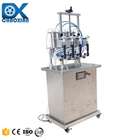 Machine de remplissage semi-automatique Alibaba à 4 têtes pour liquide désinfectant à 75 % d'alcool pour nettoyant WC