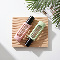 Flacon de parfum en silicone 12 ml, portable et rechargeable, à suspendre pour sacs – Nouveauté très demandée
