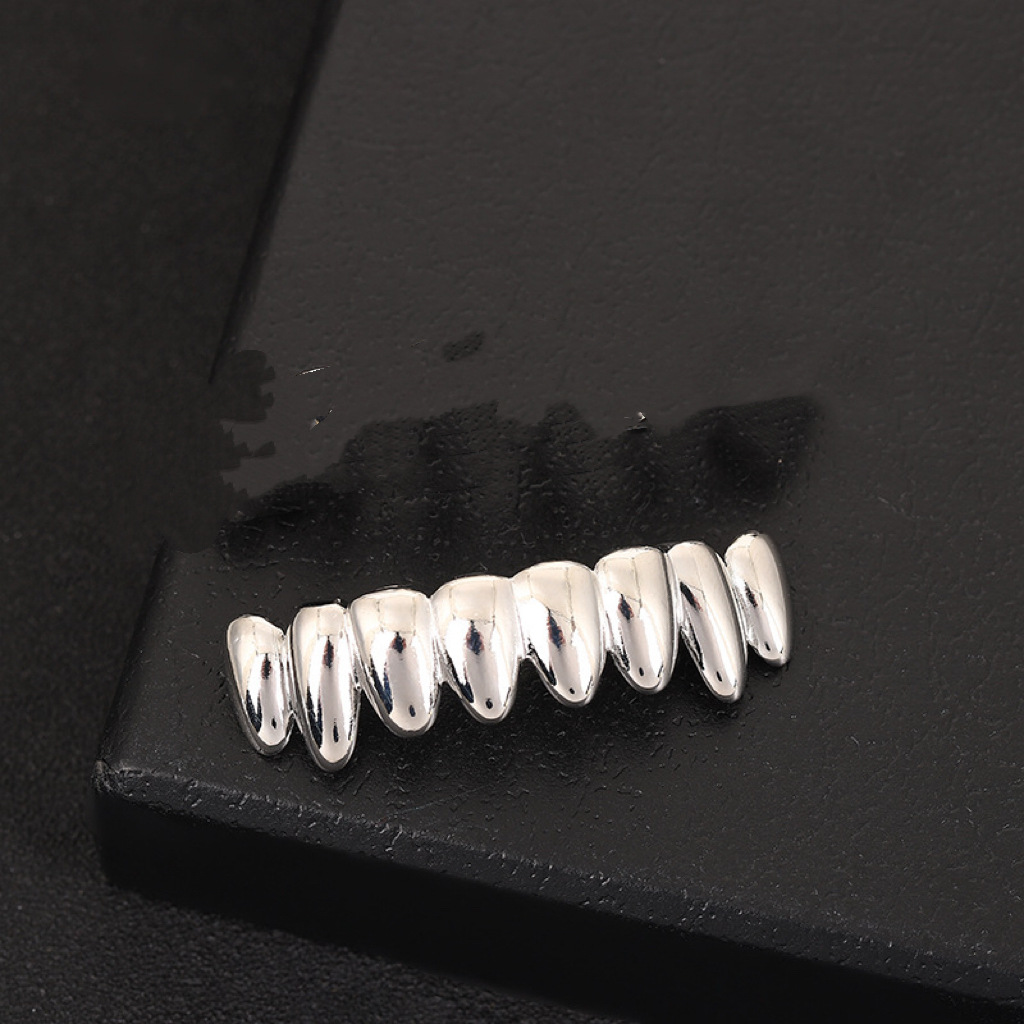 Dents inférieures en cuivre irrégulier en argent moulé à huit dents