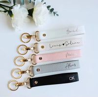 Porte-clés moderne en cuir, toucher doux, anneau métallique fin pour sac bandoulière en cuir PU, accessoire de style quotidien