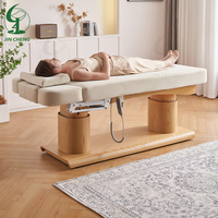 Table de massage électrique réglable Jincheng pour salon de beauté, usage scolaire, hôtelier, sportif, sous-sol et traitement par ventouses