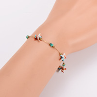 Ensemble de bijoux classique en acier inoxydable plaqué or 18 carats avec collier et bracelet ajustables, style océan et plage, pour femme