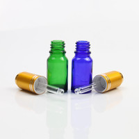 Bouteilles compte-gouttes en verre de luxe avec bouton-poussoir pour huiles essentielles, sérums et parfums – Vente en gros – 30 ml, 50 ml, 100 ml