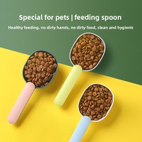 Cuillère à nourriture pour animaux 2-en-1 avec clip de sac intégré, pelle multifonction en ABS pour chien et chat, clip de scellage portable, tamis durable de qualité alimentaire
