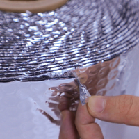 Rouleau d'isolation thermique moderne écologique à bulles, résistant au feu, à l'eau et à la chaleur, pour usage en entrepôt