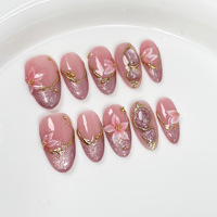 Faux ongles de luxe à presser, motif vache rose et noir, avec feuille métallique dorée, perles en strass croisées, réutilisables, faits à la main