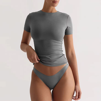 Vente en gros de vêtements de détente pour femmes-Spandex à séchage rapide-T-Shirt à manches courtes de couleur unie-Logo personnalisé-Causal Crop Tops