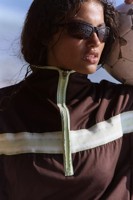 Veste de sport pour femme avec logo personnalisé OEM, légère, coupe-vent, avec bordure blanche, pour la course à pied, vente en gros
