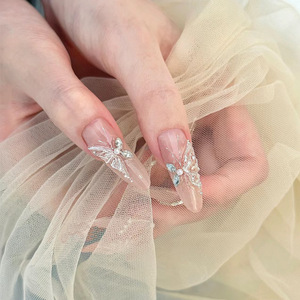 Qianya TikTok Viral Press on Nails 10 piezas-Sparkling Diamond Butterfly Hecho a mano Otoño Invierno Juego de uñas postizas para Cool Girls - Product Image 1