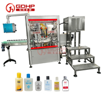 Machine de remplissage automatique d'huile émolliente et de lotion corporelle, machine tout-en-un de type rotatif pour le remplissage et le bouchage de l'émulsion d'eau et de glycérine