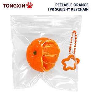 พวงกุญแจ TONGXIN รูปส้มน่ารัก แบบลอกเปลือกได้ ทำจาก TPR เนื้อนุ่ม บีบแล้วคืนตัวช้า รูปทรงส้มเสมือนจริง สวยงาม ของสะสม ของขวัญ OEM - Product Image 1